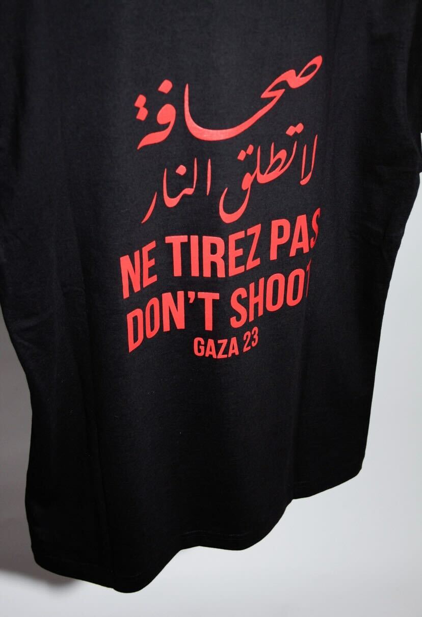 Ne tirez pas (Black with red front text)